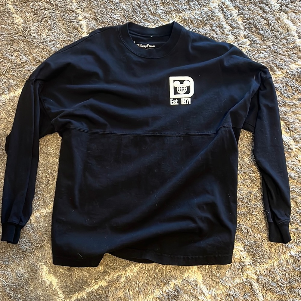 Disney Long sleeve black shirt size XS but is sized as a small